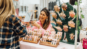 Vendor selling jewelry at Florida State Fairground.