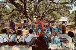 Historical Cracker Country outdoor classroom scene.
