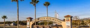 Florida State Fairgrounds entrance with palm trees.