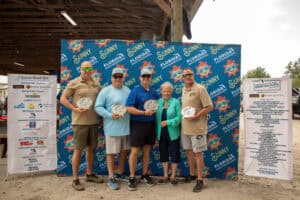 Sunshine State Fairgrounds event with smiling peop.