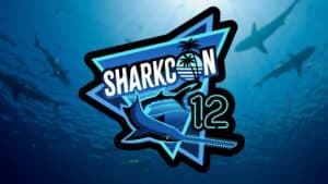 Florida State Fairgrounds SharkCon logo with shark.