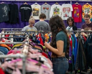Shoppers browsing clothing at Florida State Fair.