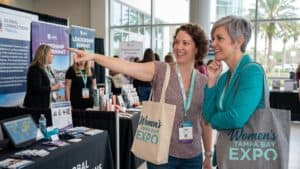 Women at Florida State Fairgrounds expo event.