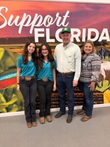 Group of four people at Florida State Fairgrounds.