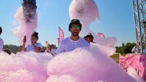 People enjoying a foam party at Florida State Fair.
